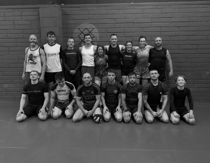 class-adults Adults BJJ class rolling live at Aontach Jiu-Jitsu, Cork
